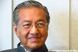 Role model for back seat driver - Mahathir