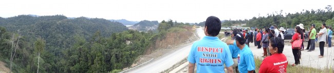 Anti-propaganda tour - local people show their ruined river to the visitors of Baram