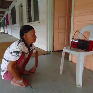 A Penan tribesman listening to RFS