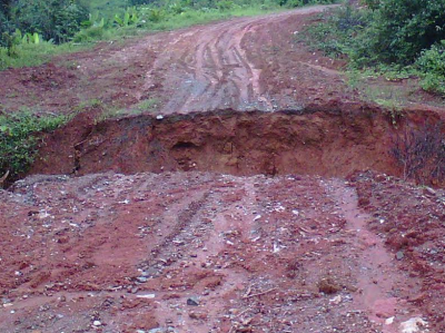 Many villages remain difficult to reach because of broken bridges, landslides and cracks on the earth such as this on the road to Pos Gob. Photo courtesy of JOAS