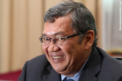 Abdul Gani Patail, the Attorney General with the bursting 'No Further Action' tray relied on by Najib.