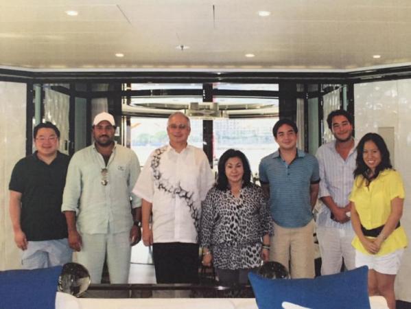 The line up - Jho Low left, Prince Turki 2nd left and Tarek Obaid 2nd right - on the yacht they hired and pretended belonged to the Sauid Prince!