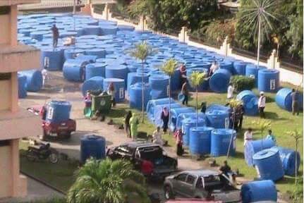 Progressive economy? - Rain water butts in Sarawak, waiting for the election to be called before being distributed to thirsty voters...