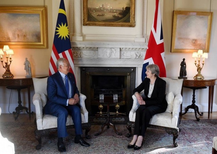 Now we know what the short little visit to Downing Street was all about. But what has the UK been promised for sending over Prince Charles and what is a promise from Najib Razak worth?